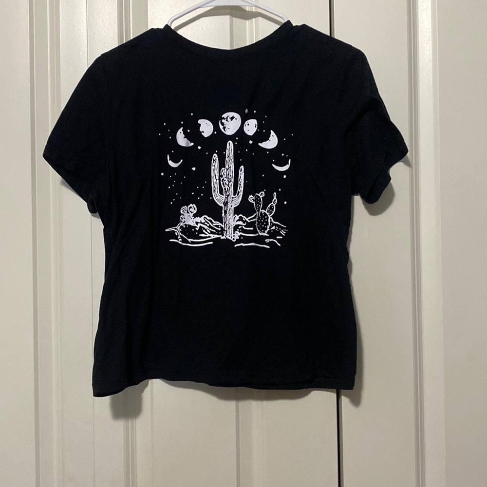 Black and white lightly worn medium t shirt